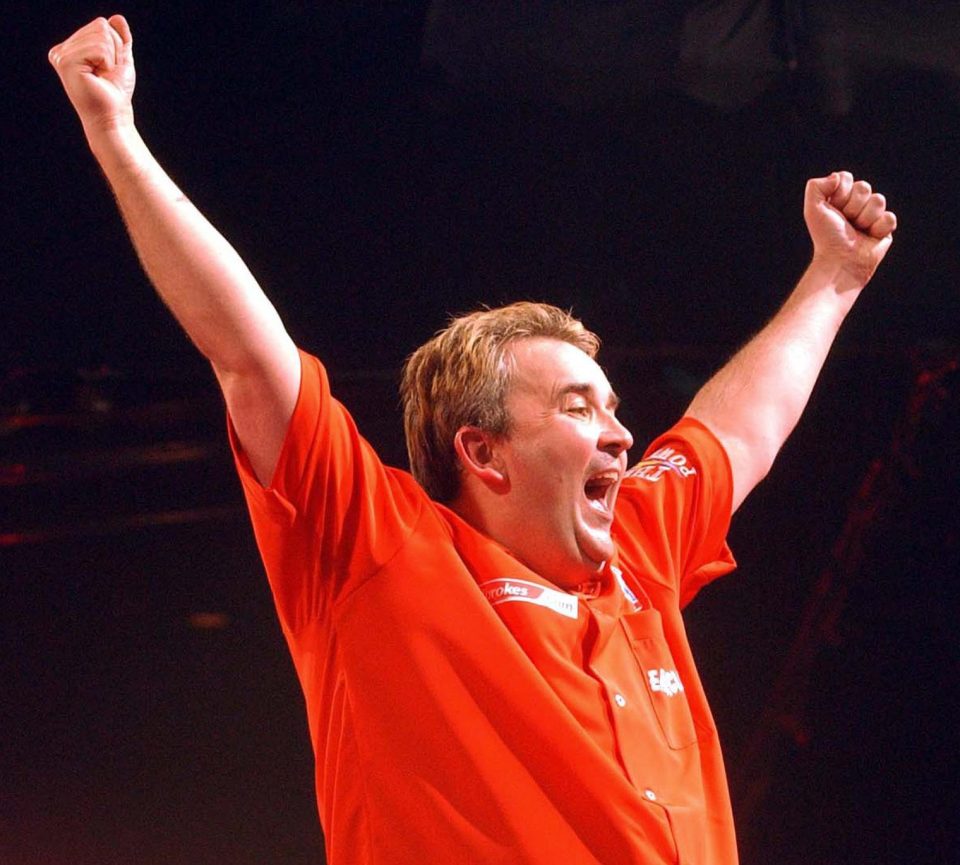 Phil Taylor won the world title 14 times from 1995 to 2013, including this victory in 2004