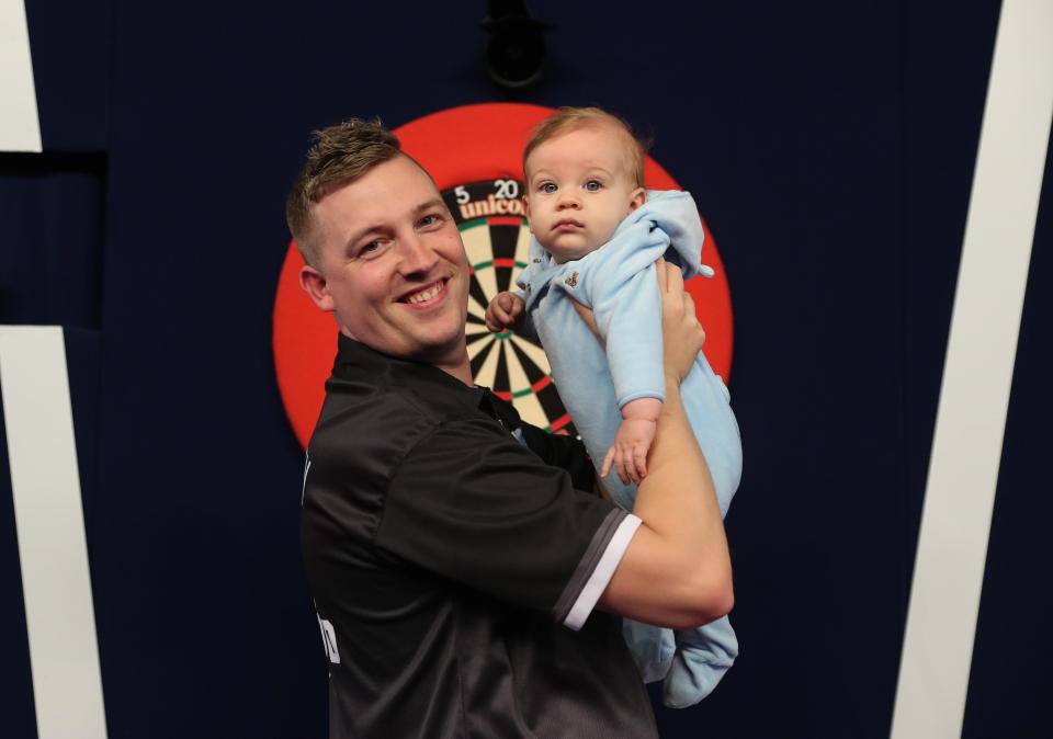 World No 38 Chris Dobey introduces his son Cole to the oche