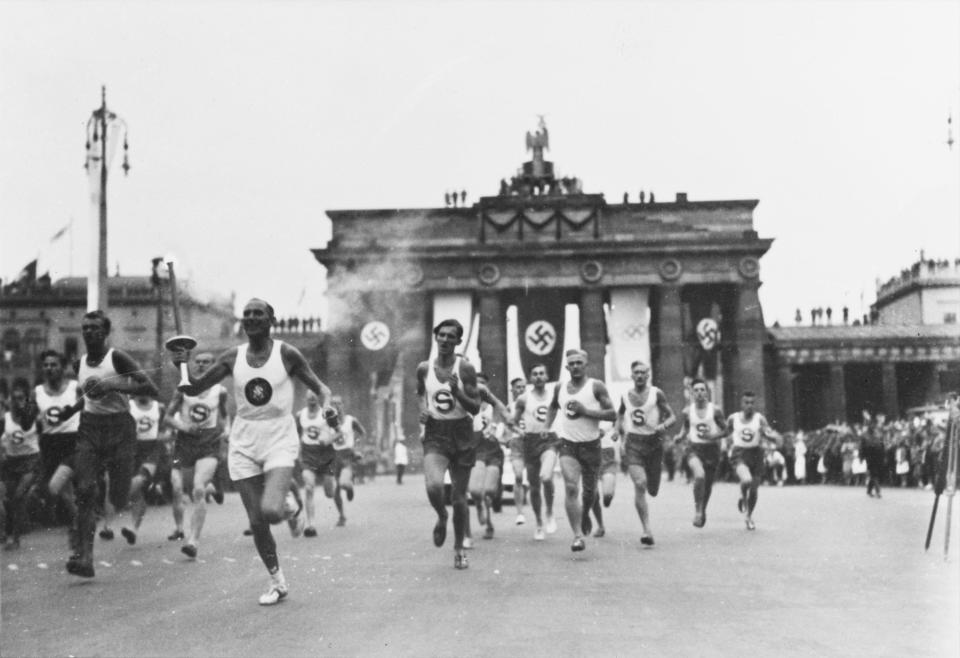 The Berlin Olympics were the first games to introduce the traditional of runners.