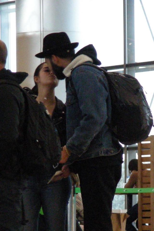  Demi Rose has been picture kissing a mystery man at the airport in Madrid