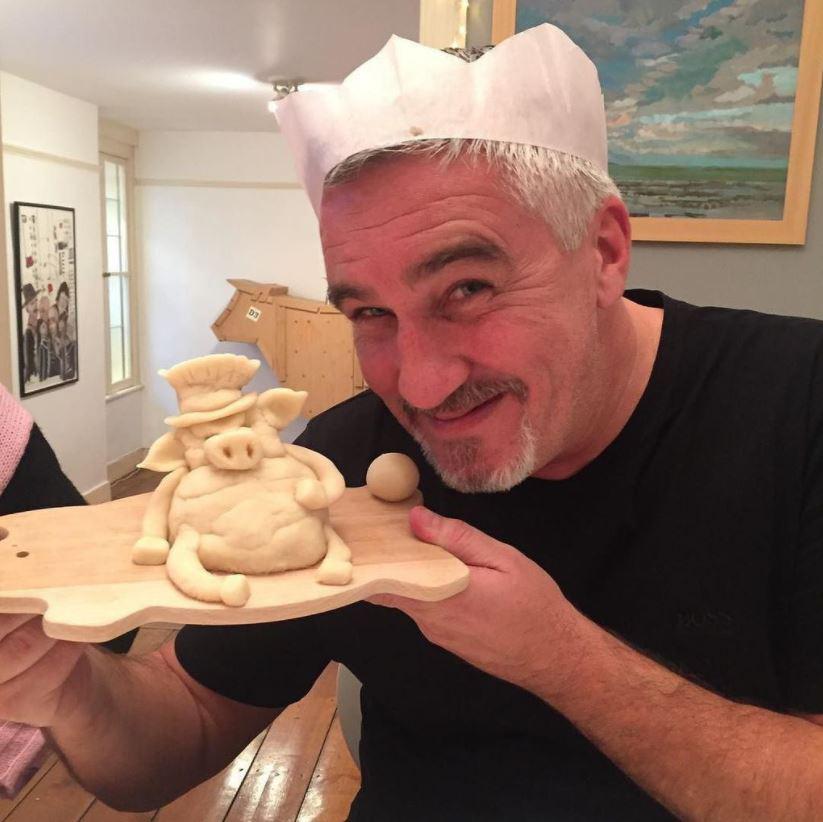  Prue also shared this snap of Paul holding a marzipan pig made for the occasion by GBBO host Noel Fielding