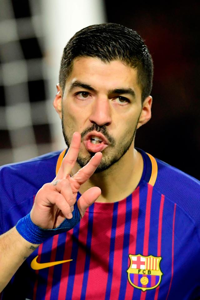  Luis Suarez scored a goal in each half to crush Deportivo