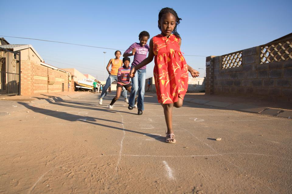  Soweto has become a thriving city of three million people where smiling children play in the streets