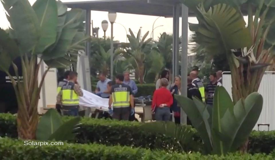  Spanish police put Steven Allford's body in an ambulance after finding him in an undignified position