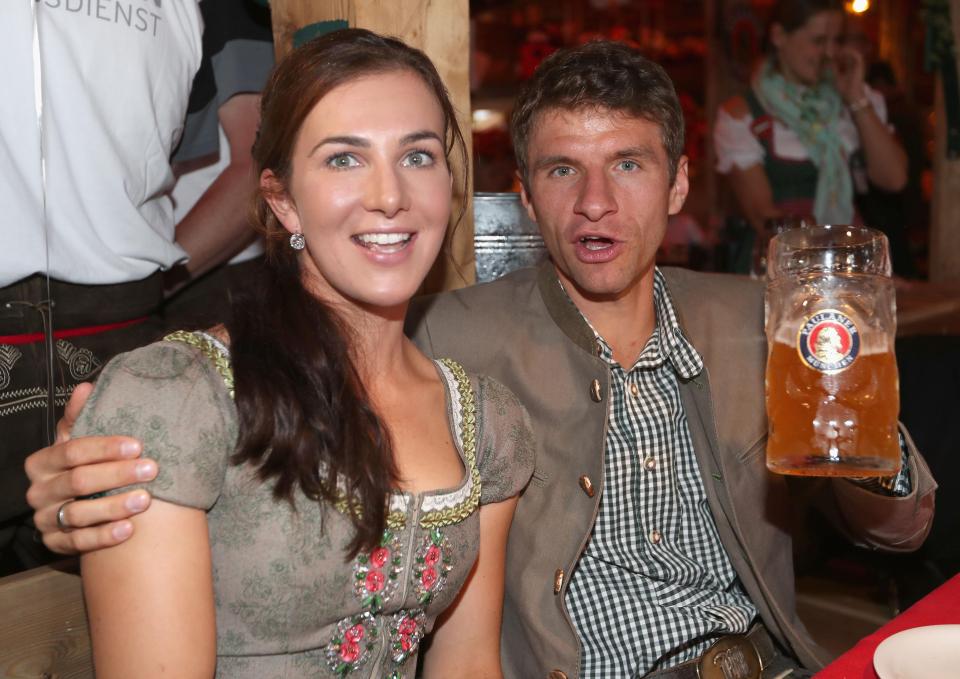  Thomas Muller enjoys Oktoberfest with wife Lisa Muller