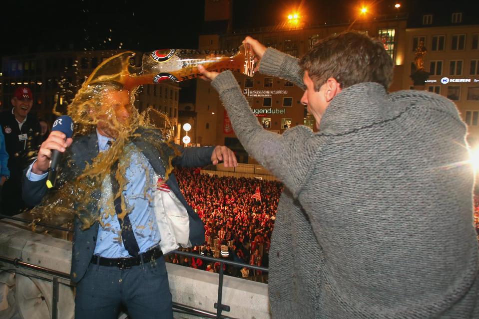  Thomas Muller drenches TV presenter Markus Othmer in beer