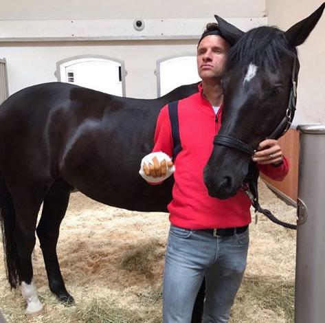  Thomas Muller loves to horse around with his nag Dave