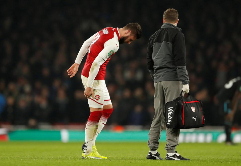  Arsenal forward Olivier Giroud limps off the pitch against West Ham