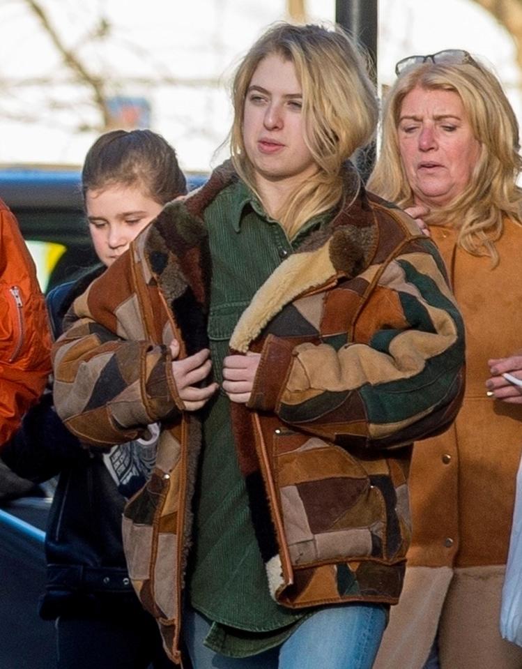  Anais kepy warm in a fur-lined suede jacket over her green blouse