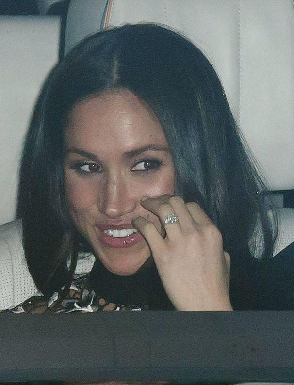  Meghan flashed her stunning engagement ring, which was designed by Prince Harry using his late mum's diamonds