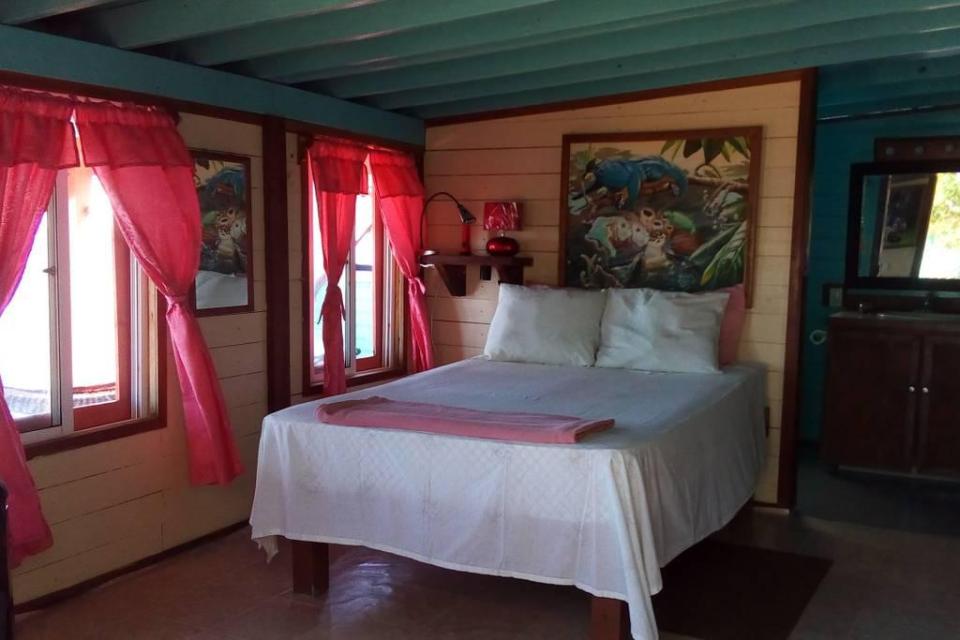 The island has a main house has a master bedroom with a double bed and two extra bedrooms 