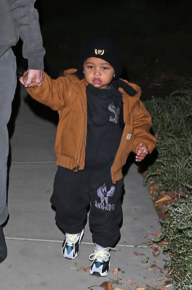  Saint West looked wrapped up for winter as he joined his family for the day