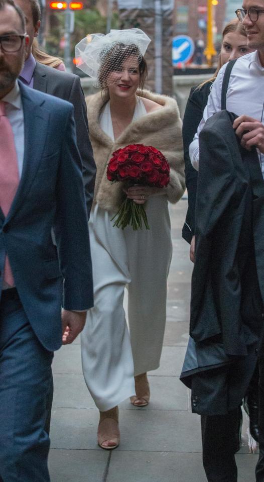  She opted for a chic white jumpsuit for the big day