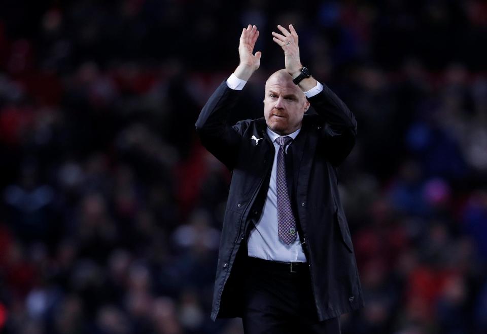  Sean Dyche applauds the travelling Burnley fans after another impressive away performance