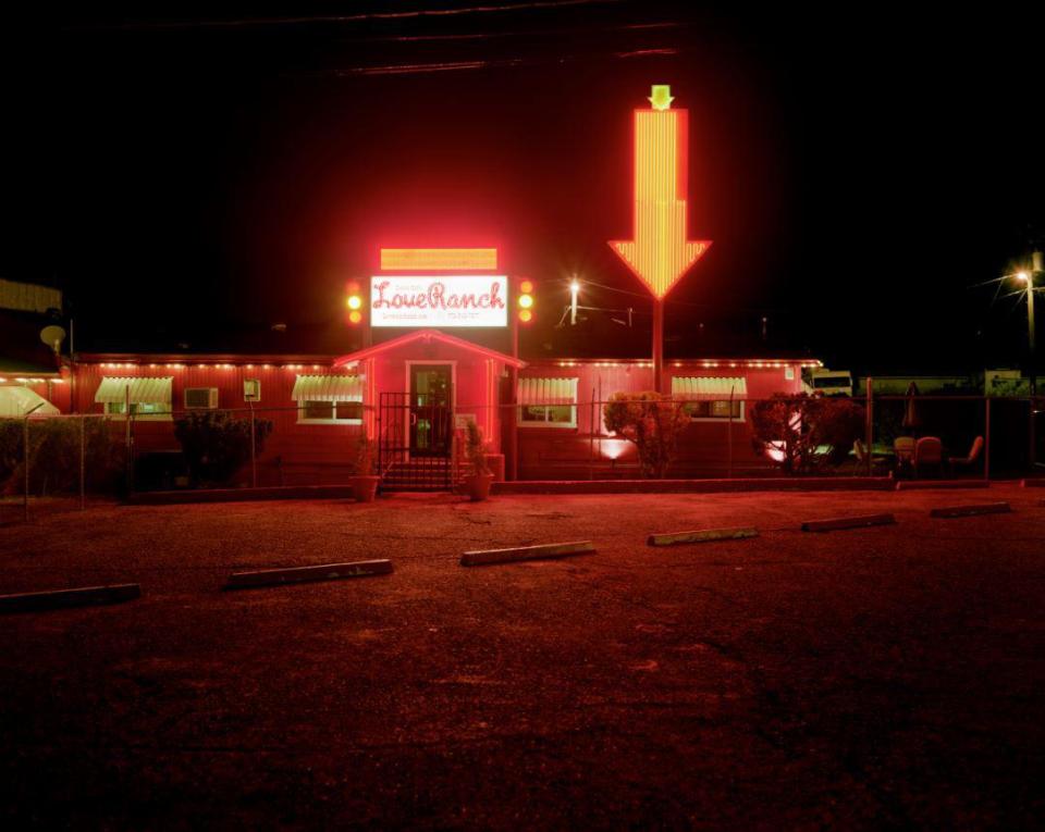  Marc managed to persuade the owners of 33 establishments to let him in, including this illuminated love ranch