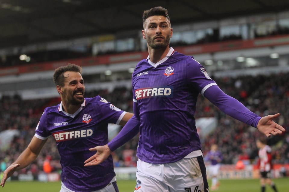 Gary Madine celebrates after scoring the winning goal for Bolton