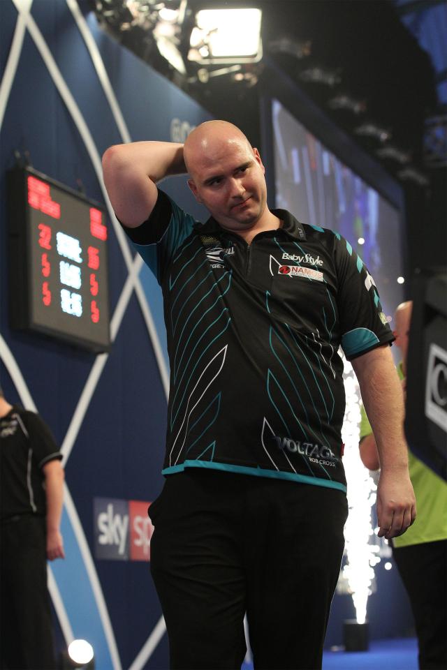  The last time Rob Cross met Phil Taylor he asked for a photo with him