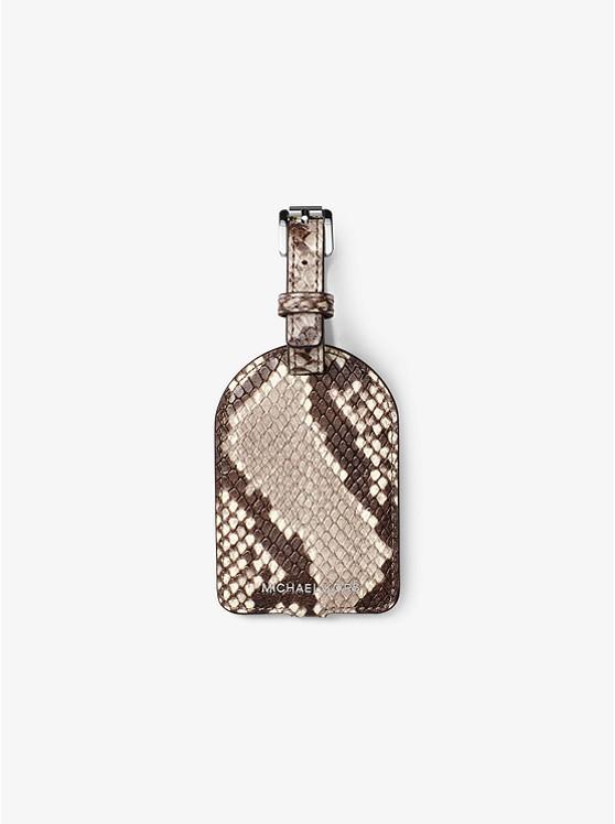  This snake-print luggage tag will spice up your oldest suitcase and at only £17.60, it's a great gifting options for friends