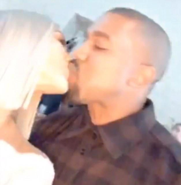  Kim and Kanye kiss as they see in 2018