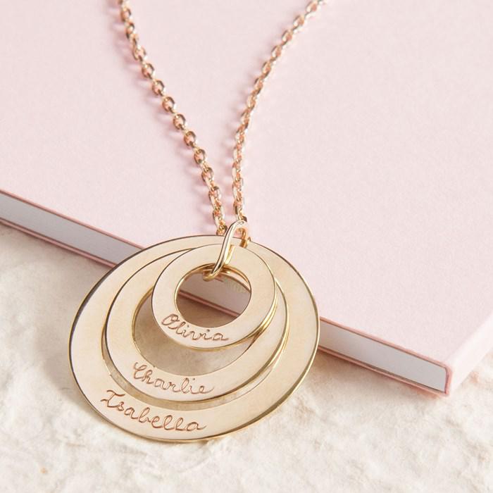  Engrave the names of her family onto this triple-tiered eternity pendant