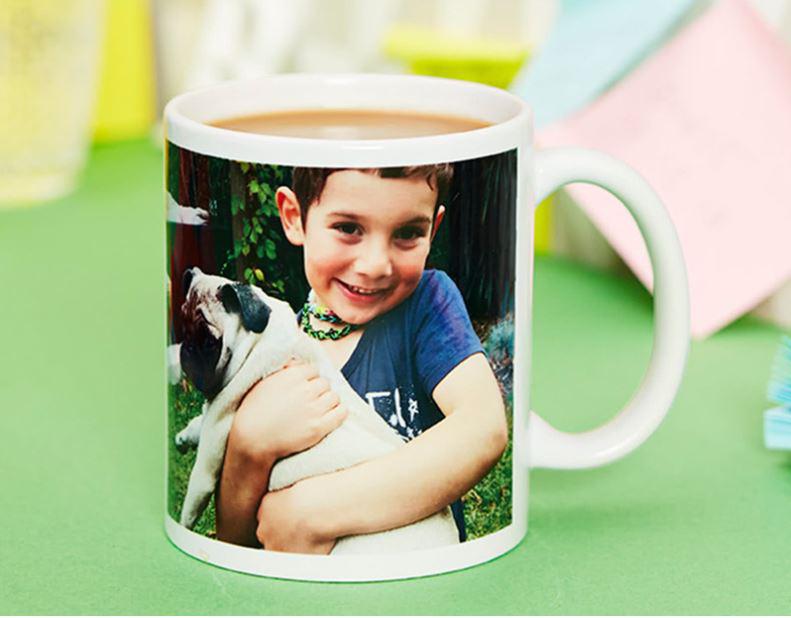  Proudly displayed on his desk, now he can show off your mug...on his mug