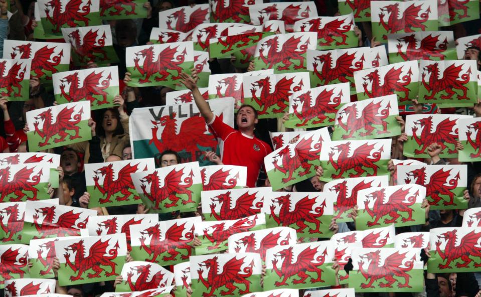  Fans raise the roof during a rousing rendition