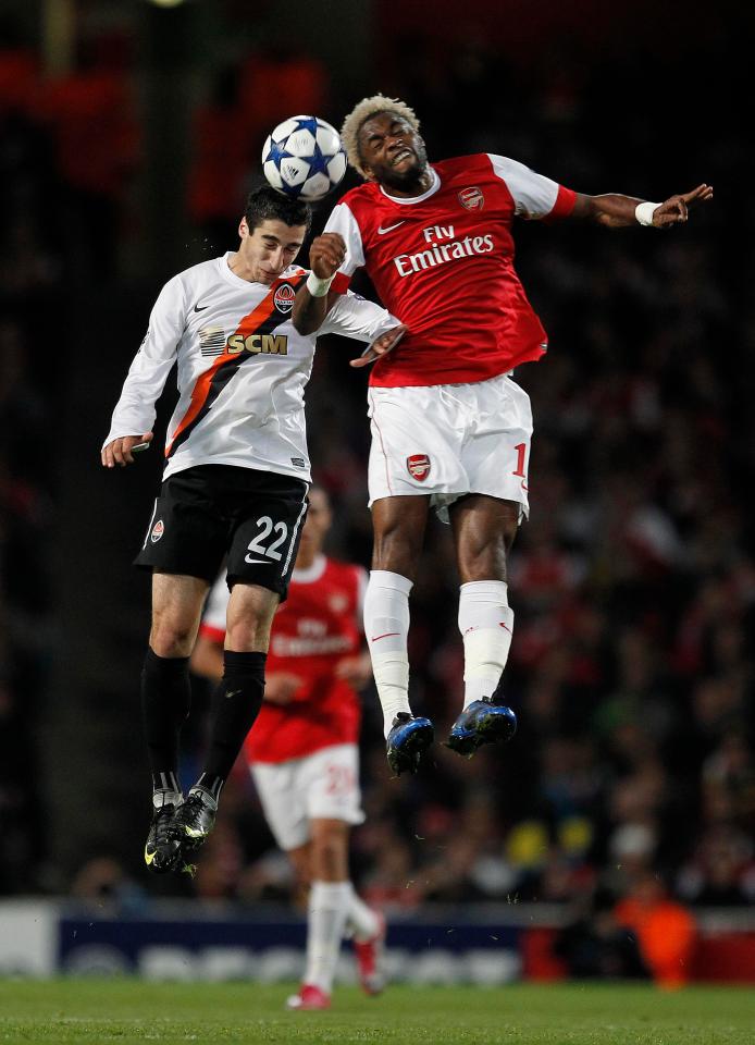  Alex Song and Mkhitaryan go up for a high ball during their Champions League clash in 2010