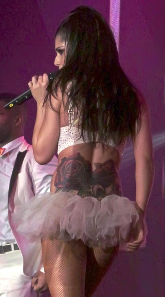  Cheryl's back tattoo was criticised by Louis