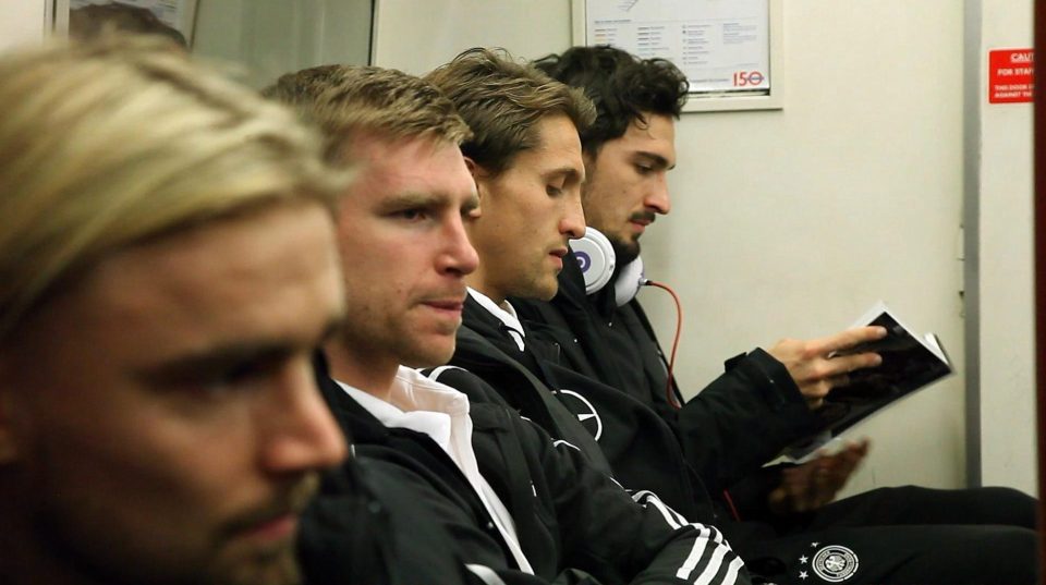  Per Mertesacker looks thrilled to be on the London Underground