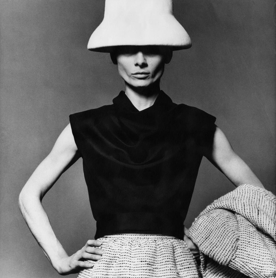  1963: Audrey poses in a Stanley-and-Livingstone hat, with a black blouse and tweed skirt by Givenchy