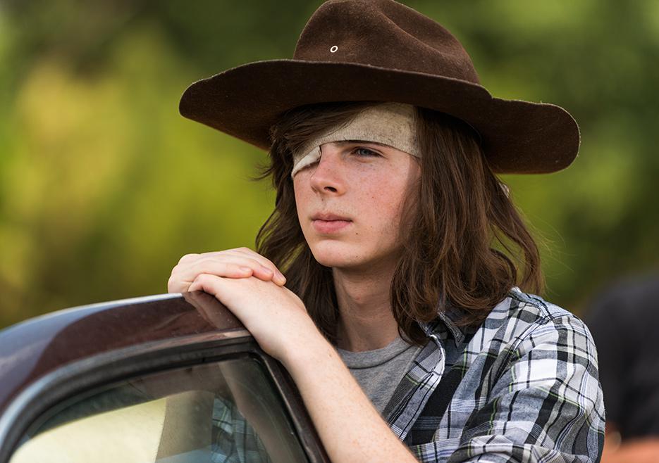  Carl Grimes, played by Chandler Riggs, revealed a zombie bite in the mid-season finale