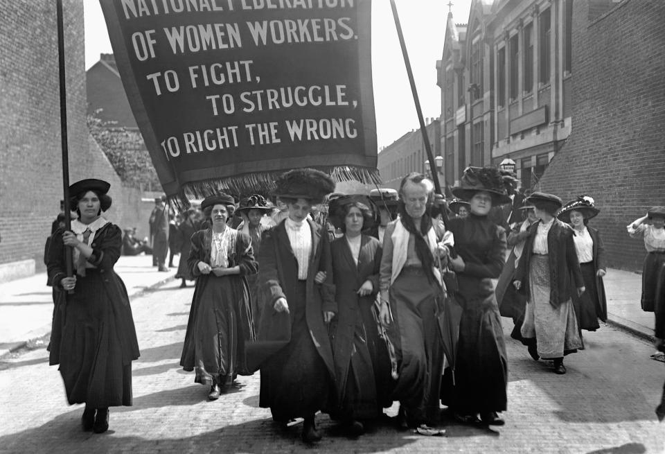  Charlotte Despard, second from right, leads a suffragette march by the National Federation of Women Workers in Bermondsey, London