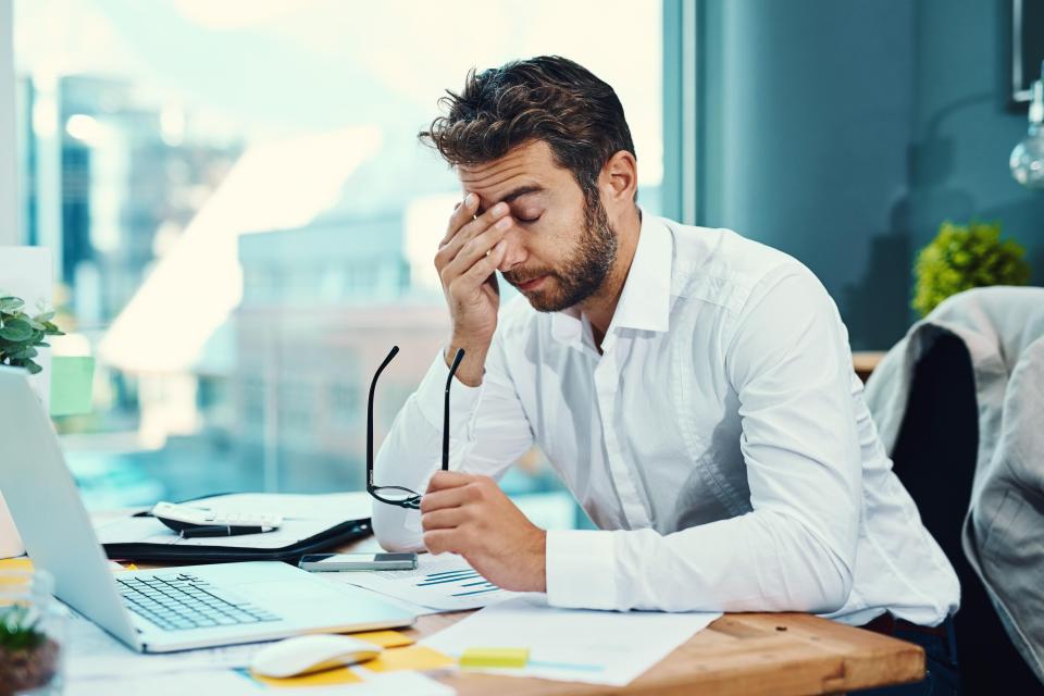  High blood pressure, sleeping problems and regularly feeling run-down are signs your job could be making you feel stressed