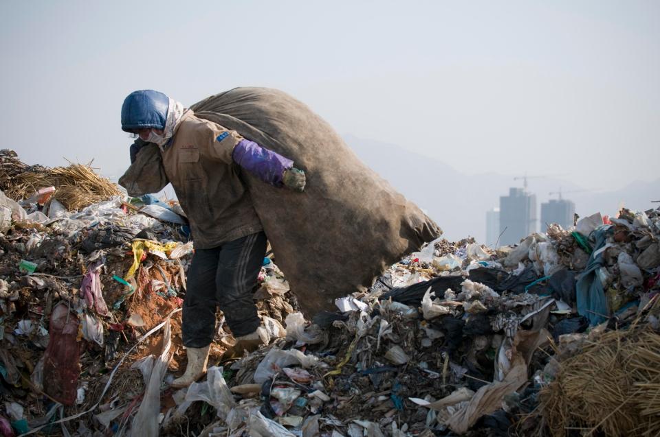  Menace . . . Plastic sorted at a dump in China