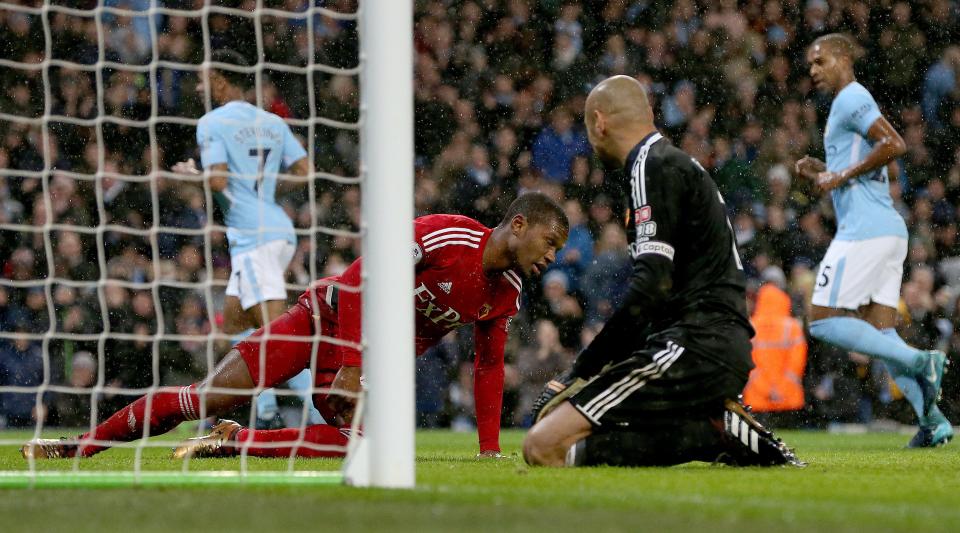  Kabasele put it in his own net to double Man City's advantage