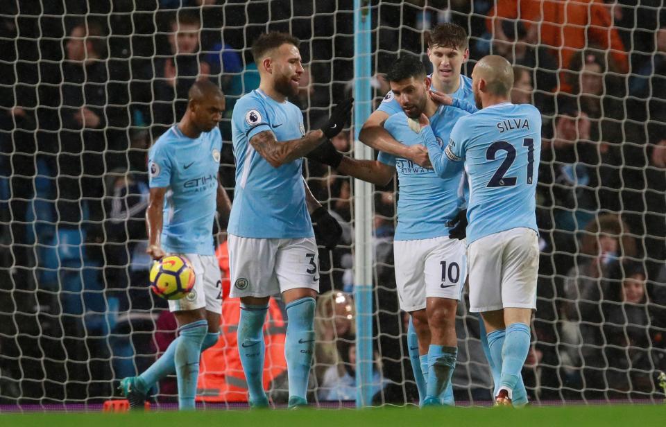  Sergio Aguero celebrates putting Manchester City three ahead