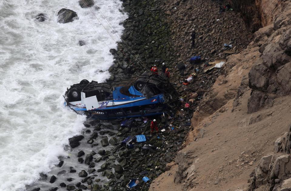 The bus plunged 100 metres (330ft) and landed upside down on rocks at the edge of the sea