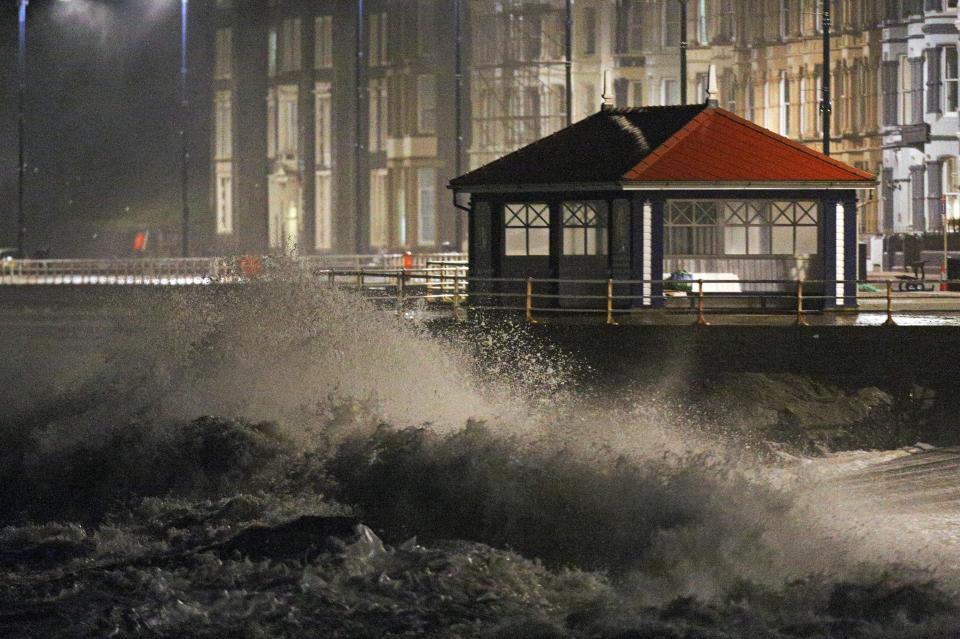  Waves crash against the sea wall in Aberystwyth in west Wales this morning as Storm Eleanor hits the UK causing power cuts and road disruption