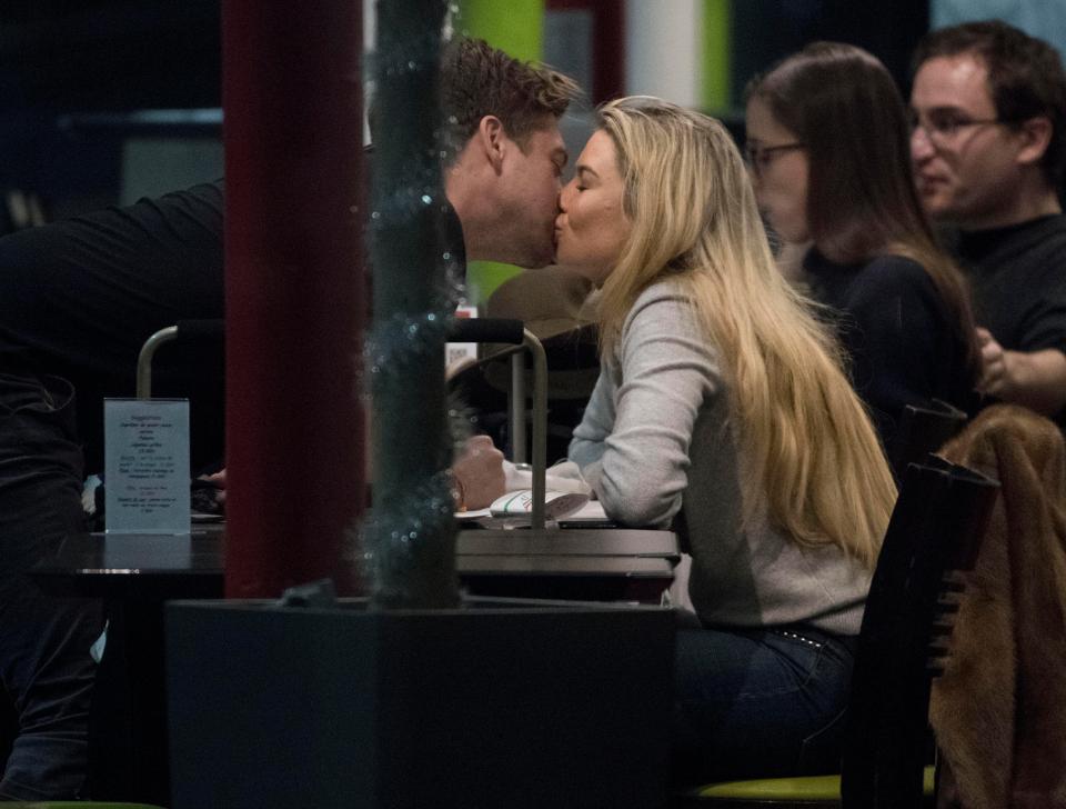 Toff and Charles enjoy snog at the airport