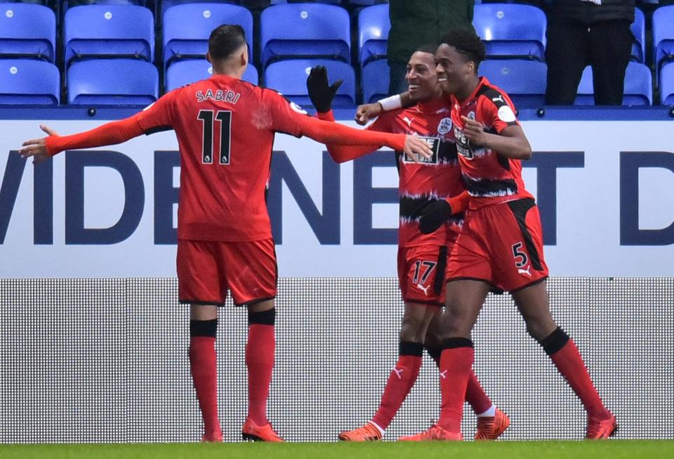 Rajiv van La Parra celebrates his strike for Huddersfield at Bolton