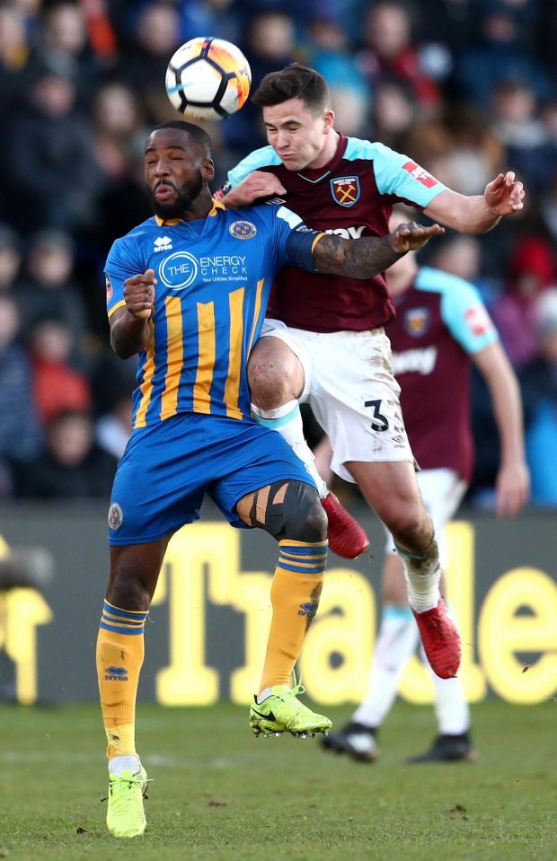 Abumere Ogogo and Josh Cullen duel for the ball before the Hammers star lost a tooth when he was kicked in the head