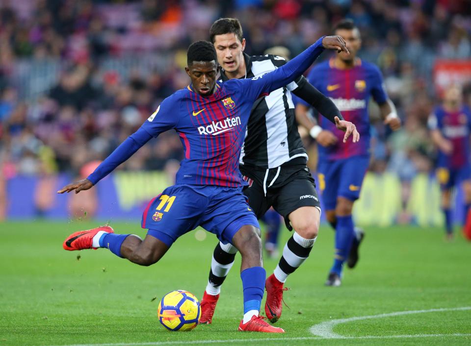  Ousmane Dembele goes for goal at the Nou Camp