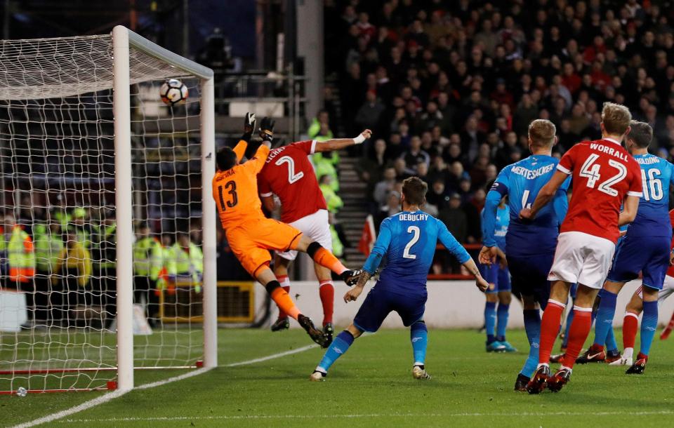  Nottingham Forest defender Eric Lichaj header his side in front against Arsenal