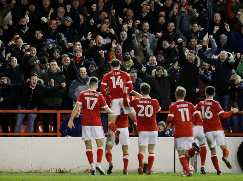  The Nottingham Forest players celebrate after regaining the lead shortly before half-time at the City Ground