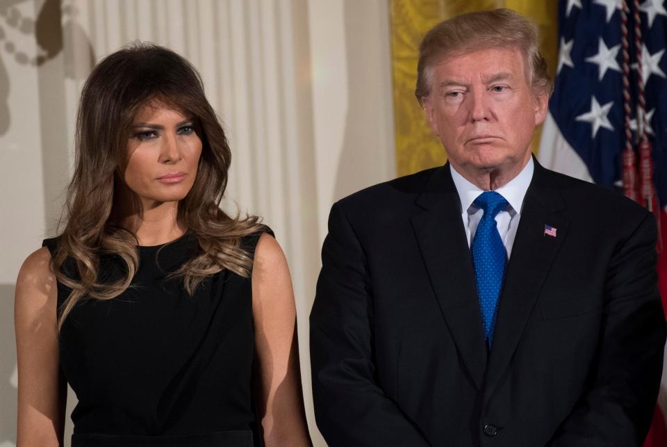  Donald Trump, pictured with wife Melania, has strenuously denied the claims