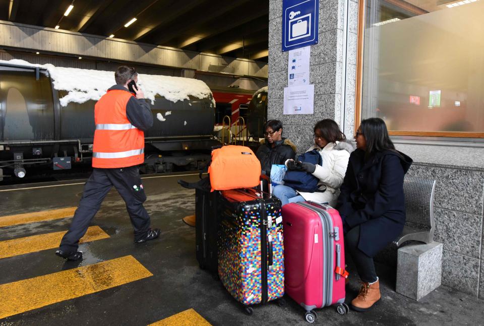  Members of the Anais family from Singapore are stranded at the Zermatt train station