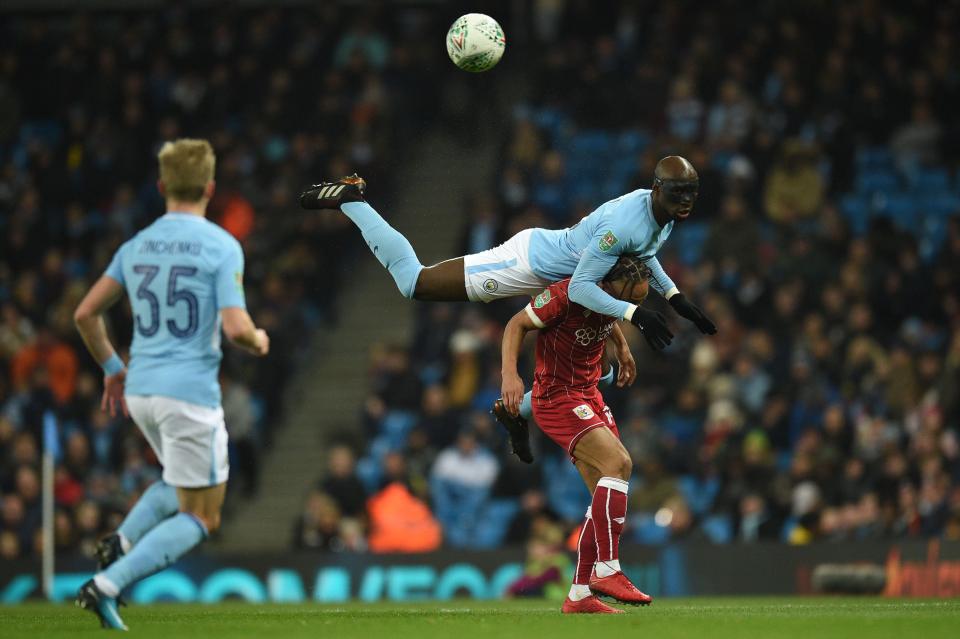  Eliaquim Mangala throws himself at a header