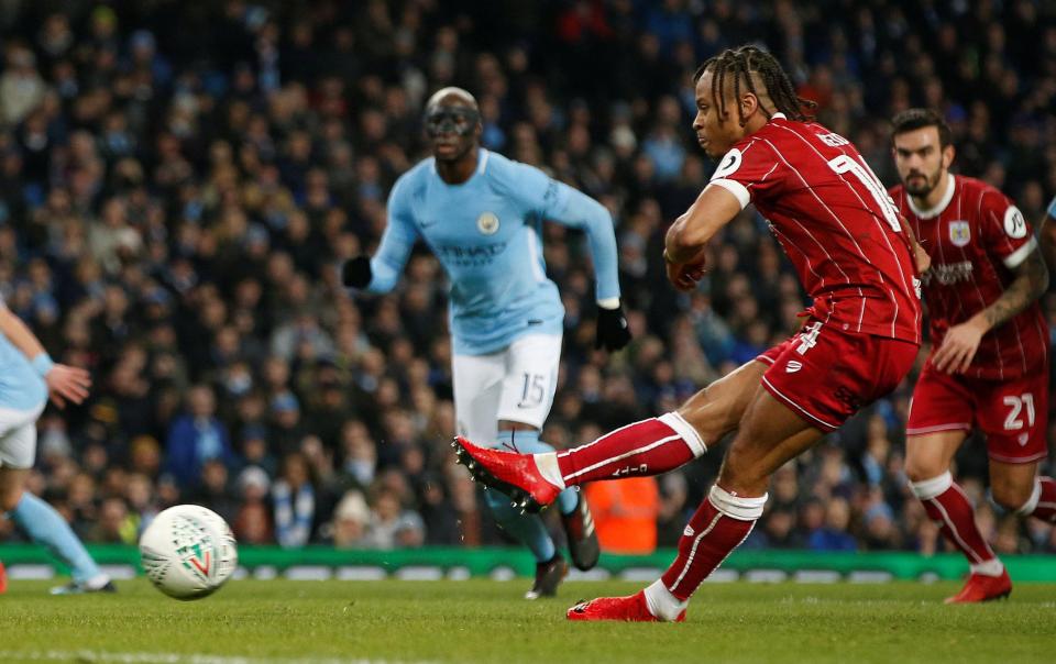  Bobby Reid kept his cool to put the Robins ahead after John Stones' foul