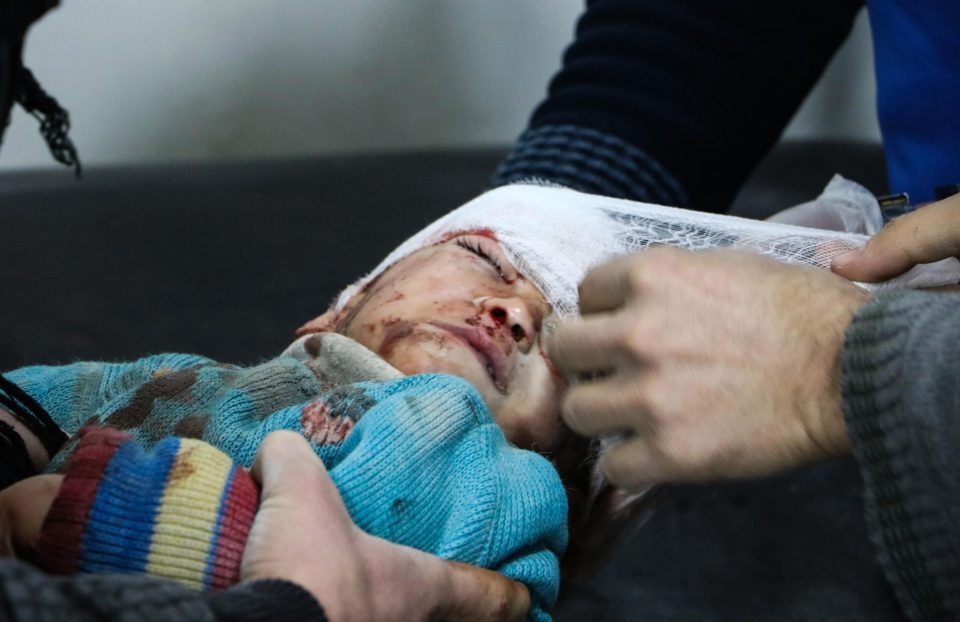  A wounded baby gets treatment at a hospital after an airstrike carried out by the warplanes