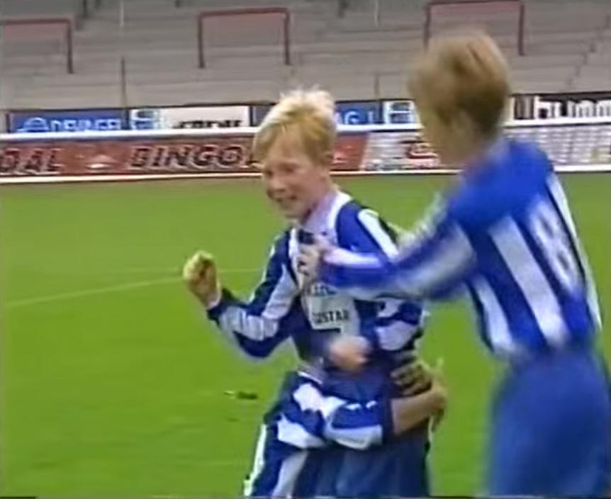  The youngster celebrates scoring for Gent's youth team